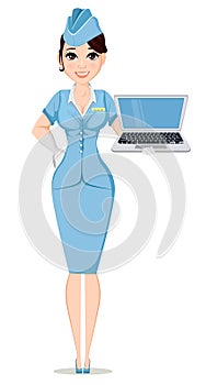 Stewardess in professional uniform. Cute smiling woman working as air hostess holding modern laptop.