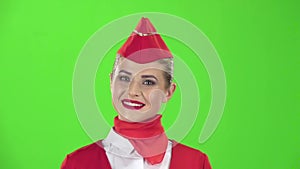 Stewardess waved her hand in a suit. Green screen. Slow motion. Close up