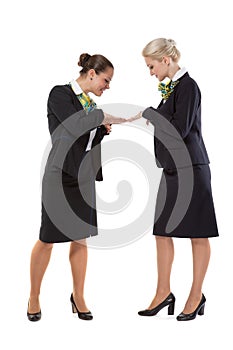 Stewardesses show each other a manicure