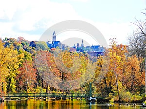 Stewart Park bridge and Cornell under fall foliage