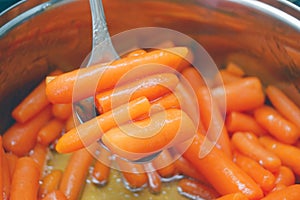 Stewed baby carrots