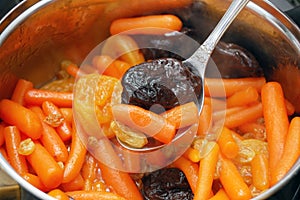 Stewed baby carrots