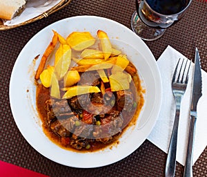 Stewed beef with vegetables (Ternera la Jardinera) - this is Spanish traditional meat dish photo