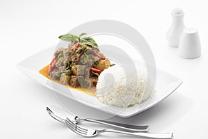 Stewed beef with vegetables on white back