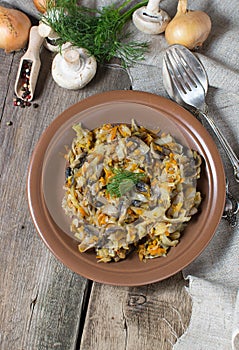 Stewed cabbage with mushrooms and carrot