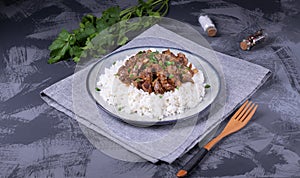 Stewed chicken gizzards on the boiled rice