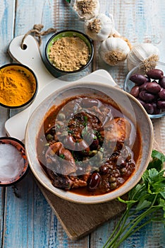 stewed polyps with tomato sauce black olives