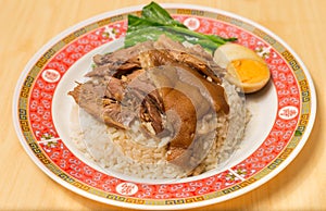 Stewed pork leg on rice with boiled egg, Traditional food in Thailand.