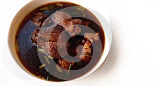 Stewed pork leg in sweet brown soup asian food fusion style,food dish chinese new year top view.