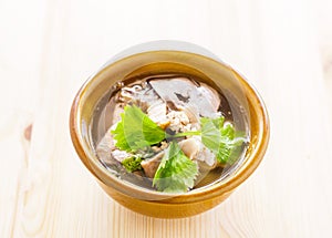 Stewed pork soup with morning glory and bean sprout.