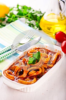 Stewed squid rings with tomato sauce