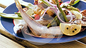 stewed in white wine Blue Whiting fish