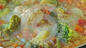 Stewing vegetables in a wok