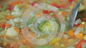 Stewing vegetables in a wok