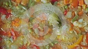 Stewing vegetables in a wok