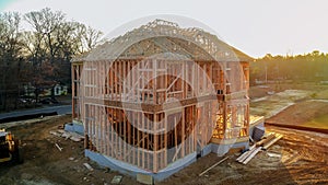 A stick built house under construction New build with wooden and beam framework photo