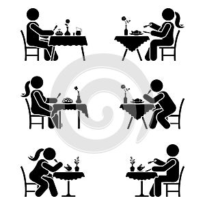 Stick figure eating pictogram set. Man and woman alone at the restaurant.