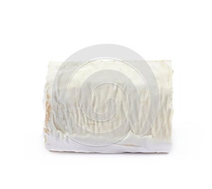 Stick of a goat cheese isolated