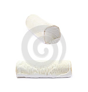 Stick of a goat cheese isolated