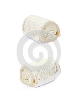 Stick of a goat cheese isolated
