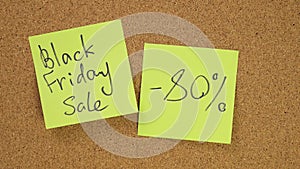 Stick the sticker black friday sale on the cork board. Top view of note board. Wall of records in the office. Leave a