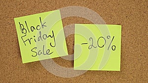 Stick the sticker black friday sale on the cork board. Top view of note board. Wall of records in the office. Leave a