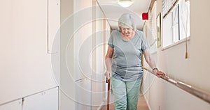 Stick, walking and old woman with a disability in recover or rehabilitation in a clinic for mobility. Healthcare