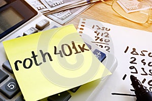 Stick with words roth 401k and money. Retirement. photo