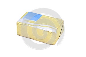 Stick of wrapped butter isolated on white