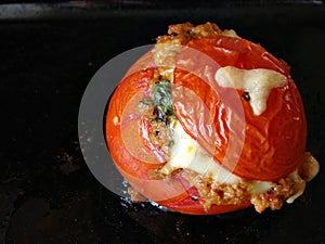 Sticked tomato with meat and cheese