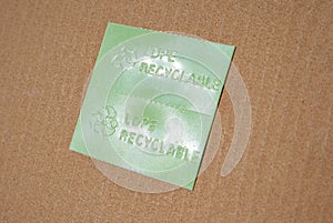 Sticker with 4-LDPE plastic recycling logo on the cardboard packaging. Low-density polyethylene.