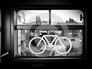 Sticker of a bike on a train window