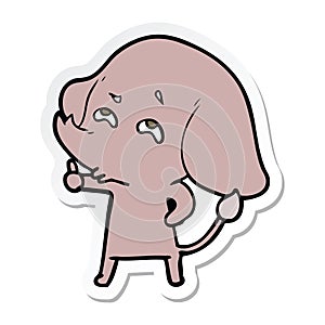 sticker of a cartoon elephant remembering