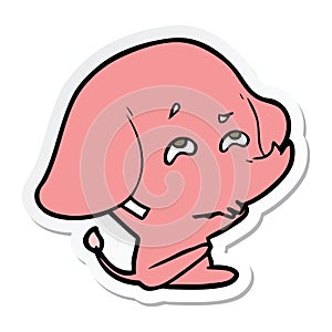 sticker of a cartoon elephant remembering