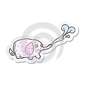 sticker of a cartoon funny little elephant squirting water