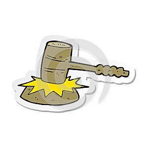 sticker of a cartoon gavel banging