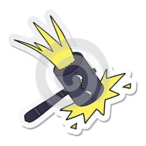 sticker of a cartoon hammer banging