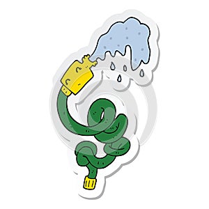 sticker of a cartoon hosepipe