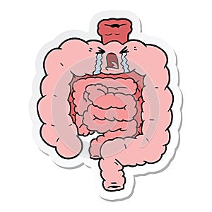 sticker of a cartoon intestines crying