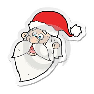 sticker of a cartoon jolly santa claus face