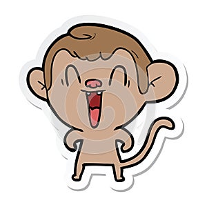 sticker of a cartoon laughing monkey