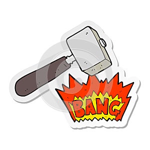 sticker of a cartoon mallet banging