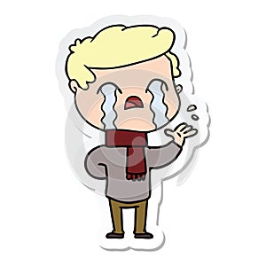 sticker of a cartoon man crying wearing winter scarf