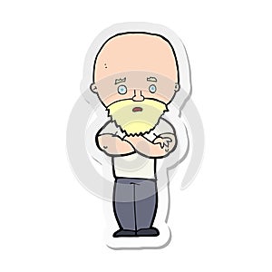 sticker of a cartoon shocked bald man with beard