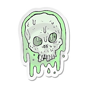 sticker of a cartoon slimy skull