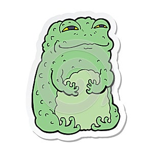 sticker of a cartoon smug toad photo