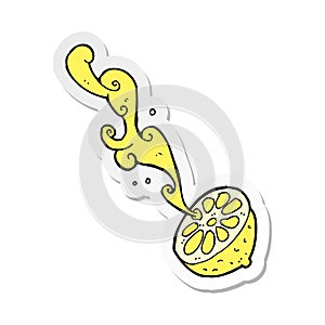 sticker of a cartoon squirting lemon