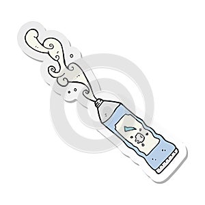 sticker of a cartoon toothpaste squirting