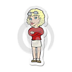 sticker of a cartoon woman with crossed arms and safety goggles