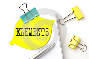 Sticker with ELEMENTS text on notebooks on the white background